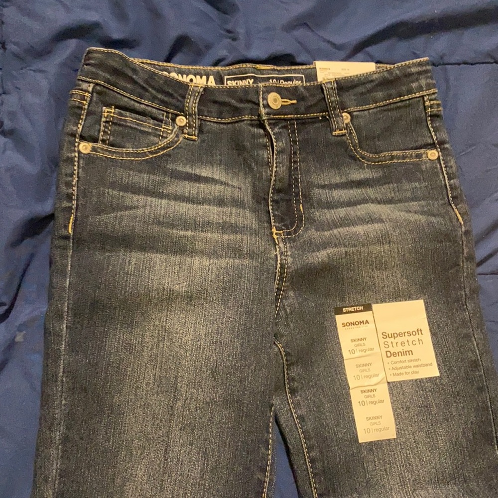 size 10, jeans, brand new (no refunds)